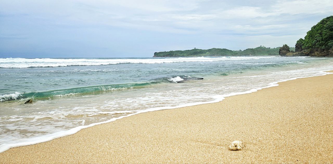 Hidden white sand beach in southern Blitar