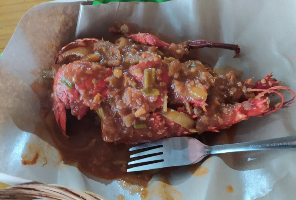 Grilled lobster served near Tambakrejo Beach
