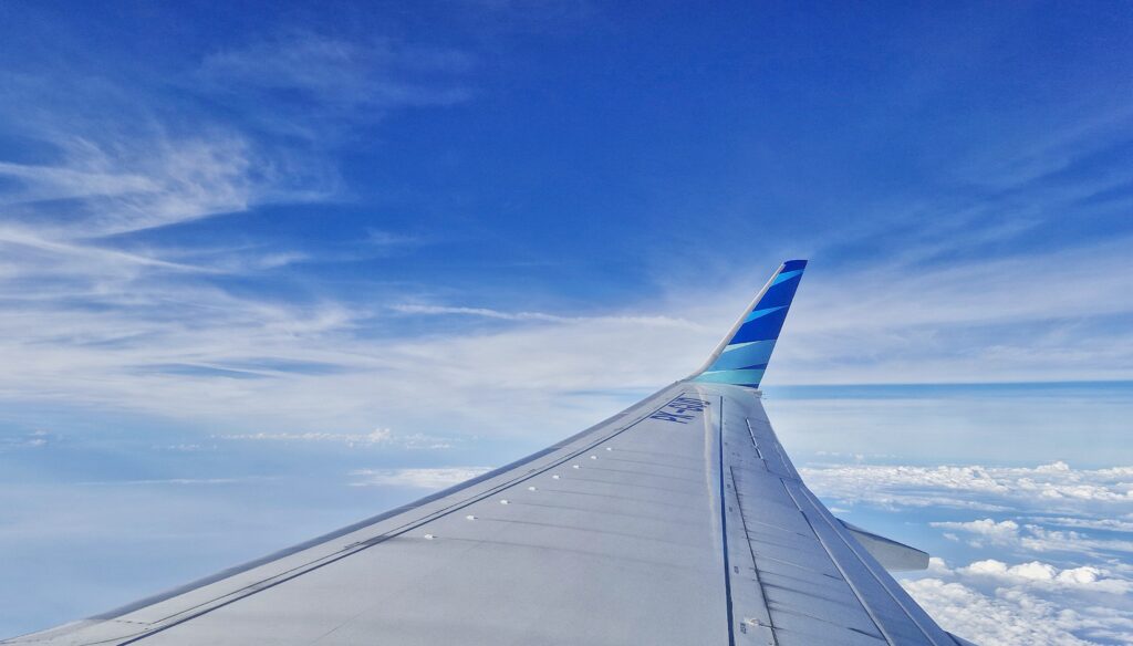 Cloudscape view from window seat on commercial flight