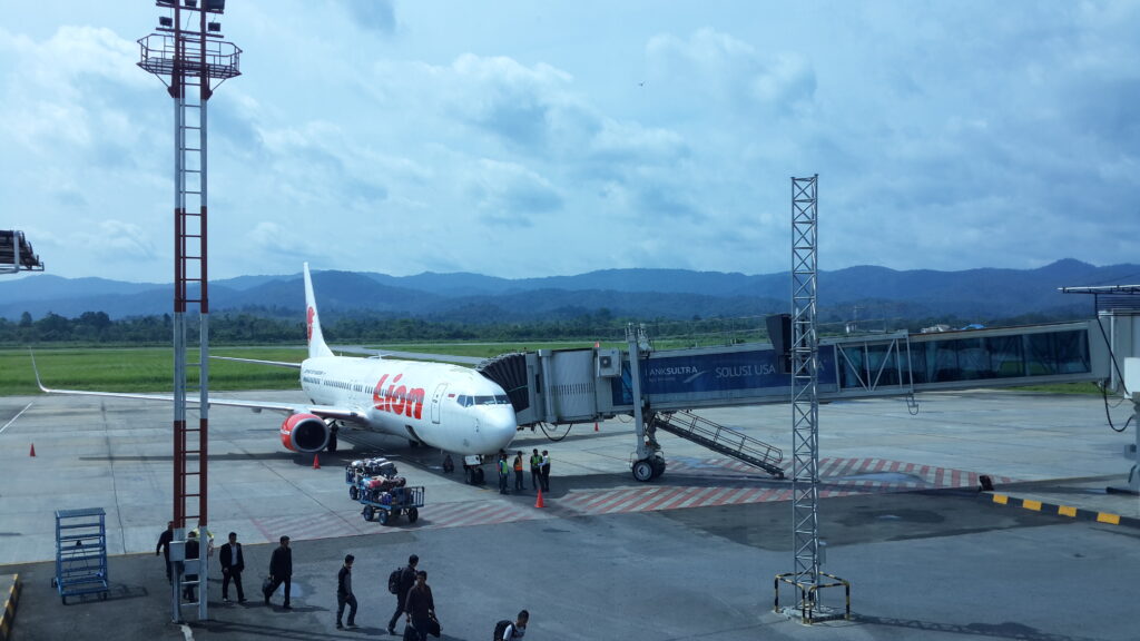 Airplane landing at Haluoleo Airport in Kendari, Indonesia