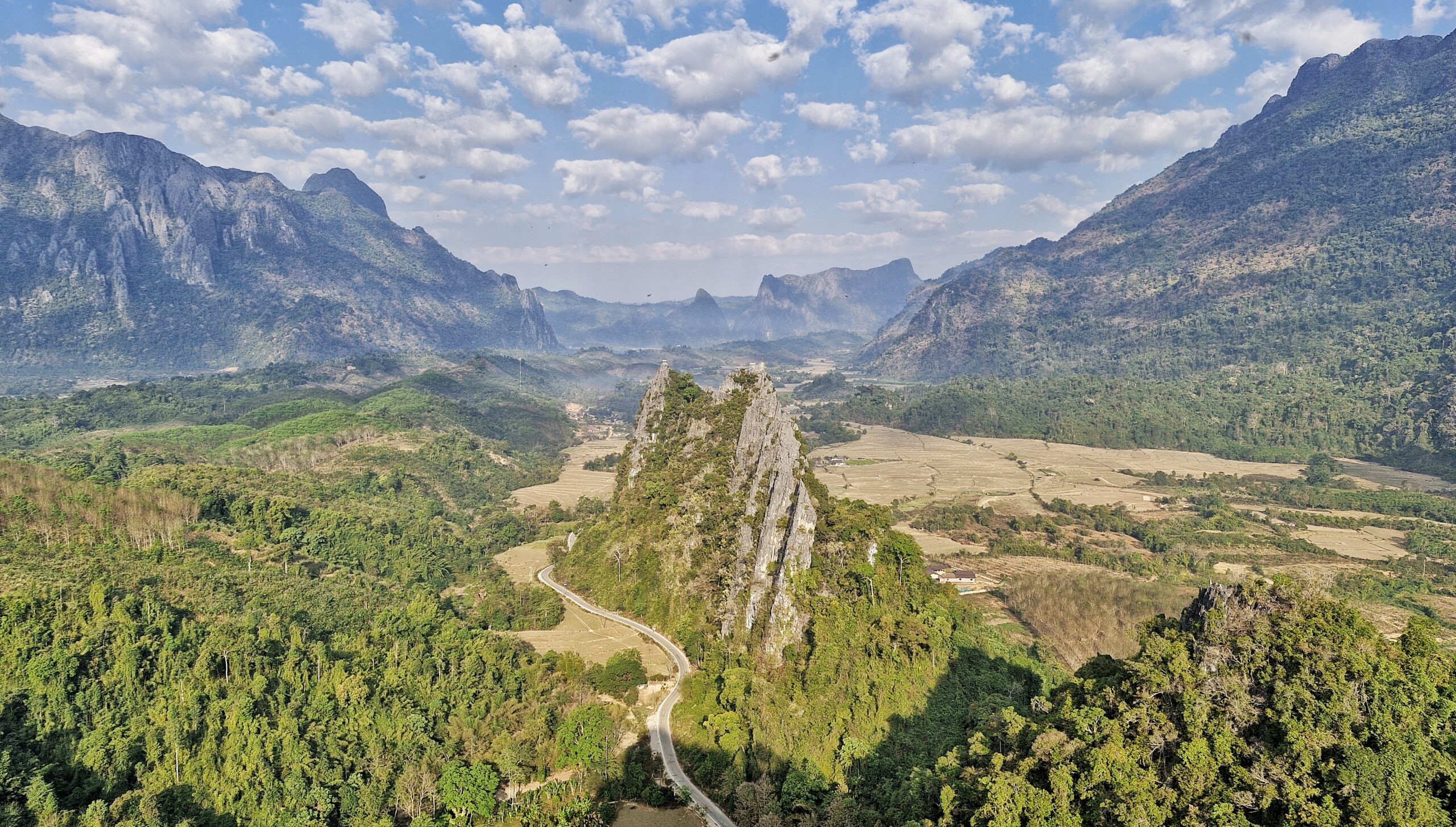 Hiker enjoying scenic viewpoint at Nam Xay in Vang Vieng