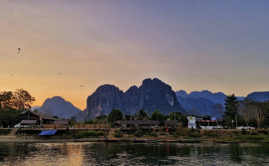 Sunset over karst mountains in Vang Vieng Laos