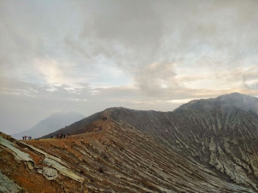 Panoramic sunrise at Ijen volcano summit in Banyuwangi Indonesia